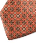 Orange and gold patterned silk tie